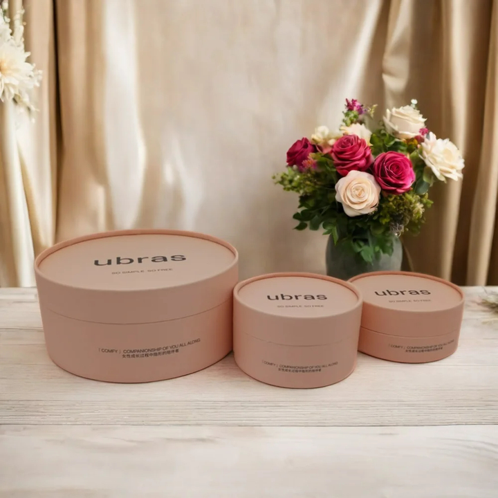 Boîtes de tubes d'emballage de T-Shirt en carton Kraft recyclé, papier artisanal rond biodégradable avec gaufrage pour le stockage