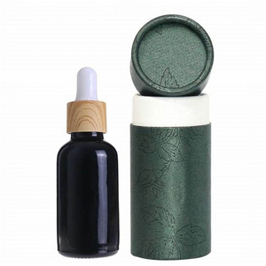 Emballage de boîte de tube rond emballé par carton cosmétique personnalisé de haute qualité pour bouteille de parfum d'huile essentielle