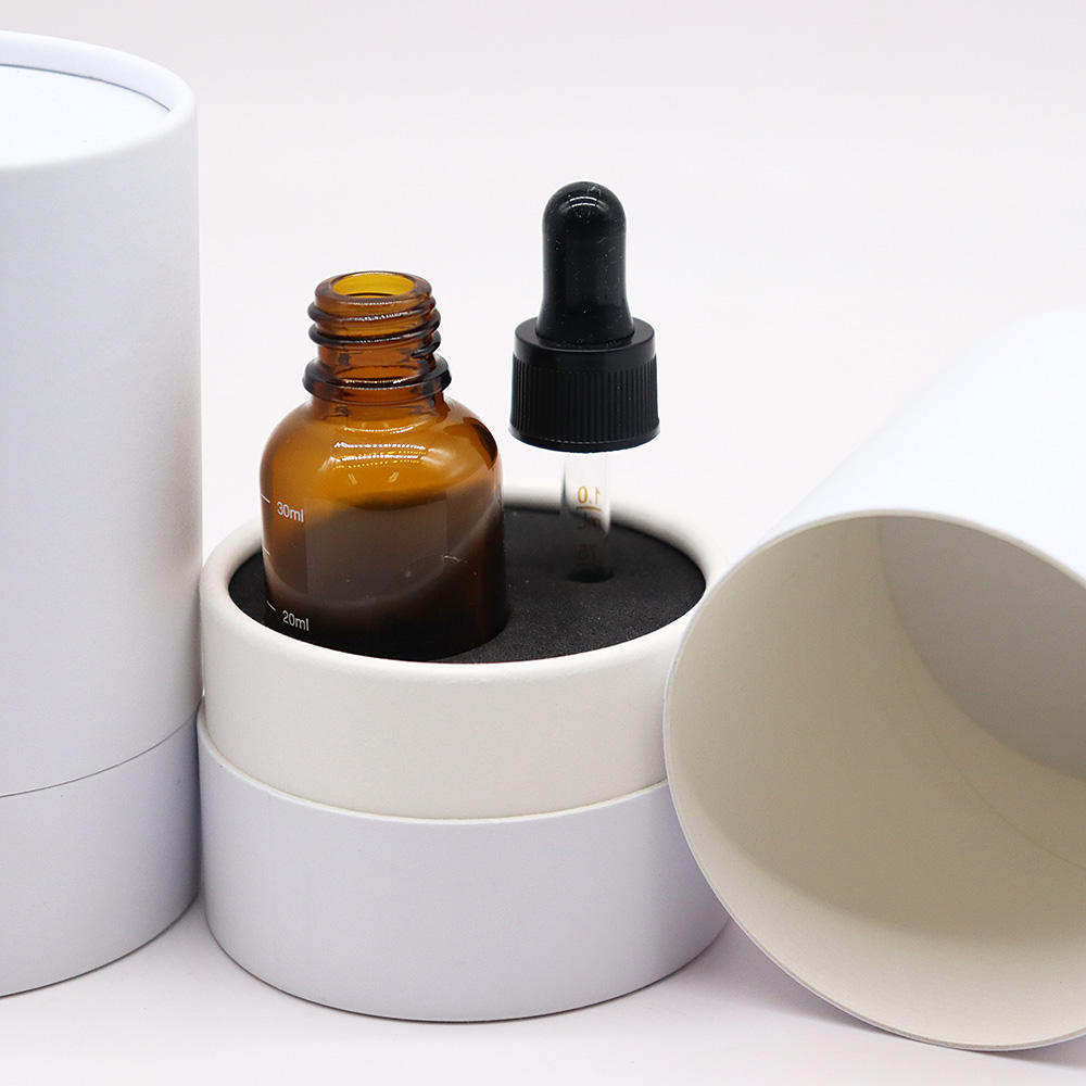 Emballage cosmétique de luxe fait sur commande de tube de papier de boîte de cylindre de carton pour la bouteille de parfum liquide de collagène d'huile essentielle