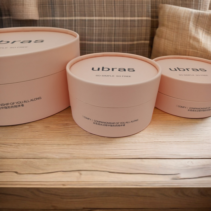 Boîtes de tubes d'emballage de T-Shirt en carton Kraft recyclé, papier artisanal rond biodégradable avec gaufrage pour le stockage