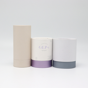 Emballage de tube rond emballé en carton cosmétique personnalisé de haute qualité pour bouteille de parfum d'huile essentielle